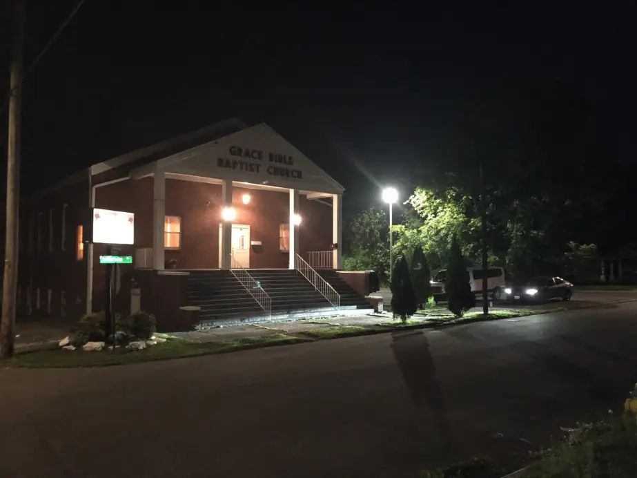 Grace Bible Baptist Church lit up at night on Jefferson Avenue